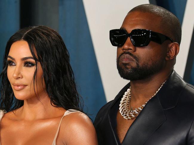 (FILES) In this file photo US media personality Kim Kardashian (L) and husband US rapper Kanye West attend the 2020 Vanity Fair Oscar Party following the 92nd Oscars at The Wallis Annenberg Center for the Performing Arts in Beverly Hills on February 9, 2020. - Reality TV star Kim Kardashian has filed for divorce from rapper Kanye West after almost seven years of marriage, US media reported February 19.   Kardashian's lawyer Laura Wasser filed papers confirming a split first rumored back in January, when the mega-celebrity couple were reported to be living separately, Fox News said. (Photo by Jean-Baptiste Lacroix / AFP)