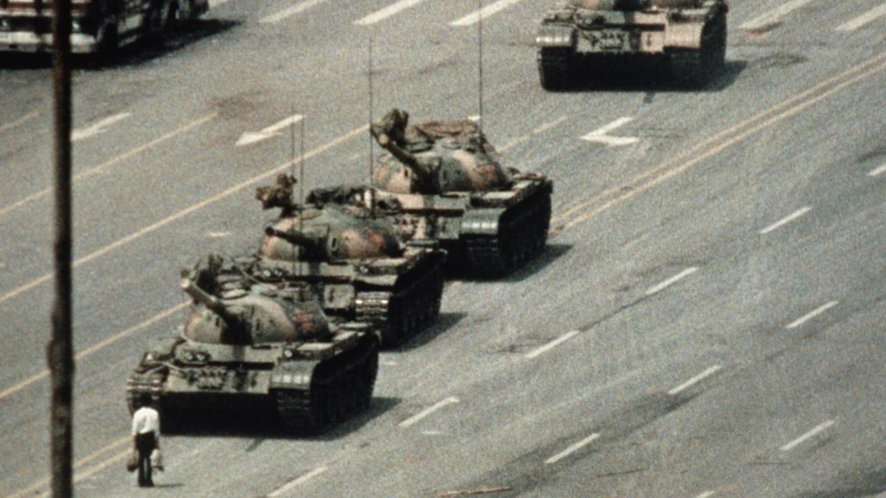 The iconic image of ‘tank man’, a Beijing demonstrator who blocked the path of a tank convoy along the Avenue of Eternal Peace near Tiananmen Square.