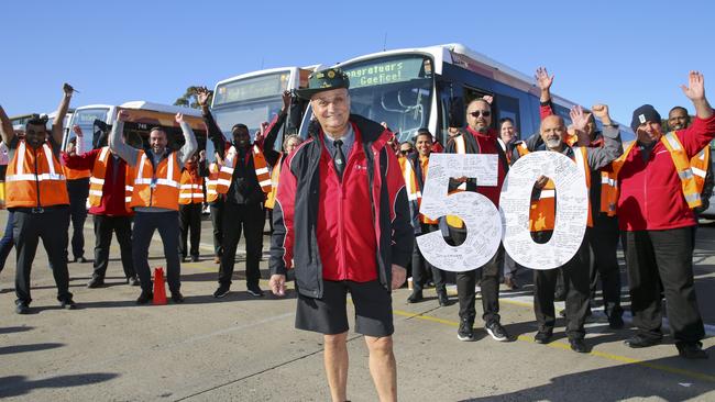 Gaetan D’Avoine’s workmates help him celebrate his 50-year milestone. Picture: Wayne Taylor