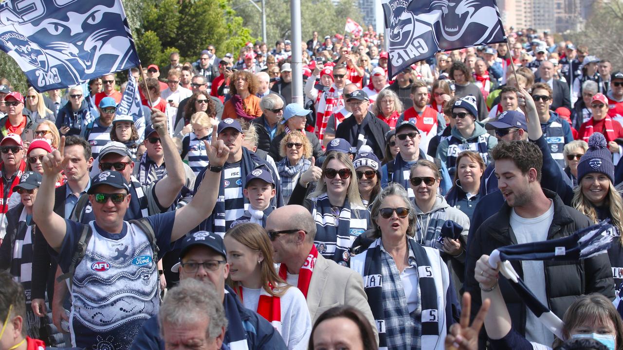 Geelong fans march to the MCG for the 2022 AFL Grand Final in Melbourne. Picture: NCA NewsWire / David Crosling