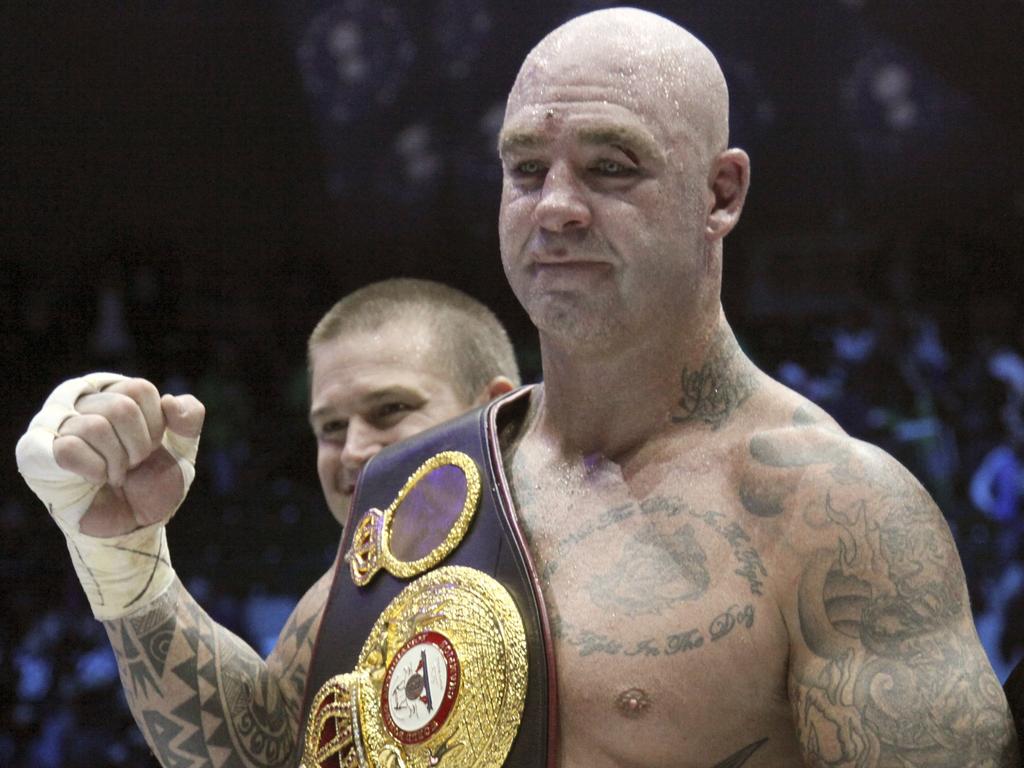 Australia's Lucas Browne celebrates his victory over Uzbekistan's Ruslan Chagaev in their WBA world heavyweight boxing title during 2016. Picture: AP Photo/Musa Sadulayev