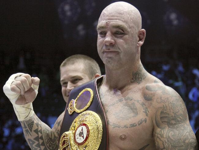 Australia's Lucas Browne celebrates his victory over Uzbekistan's Ruslan Chagaev in their WBA world heavyweight boxing title during 2016. Picture: AP Photo/Musa Sadulayev