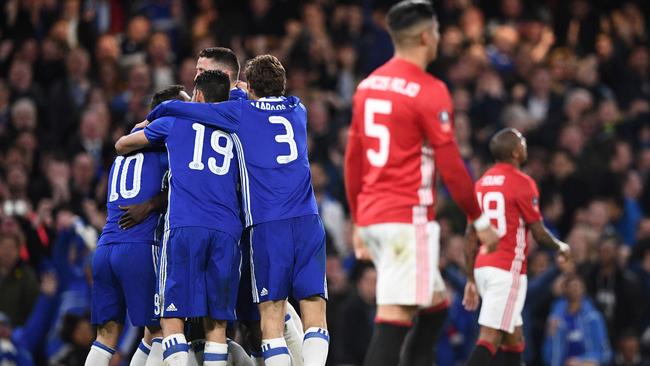 Chelsea players celebrate with Chelsea's French midfielder N'Golo Kante.