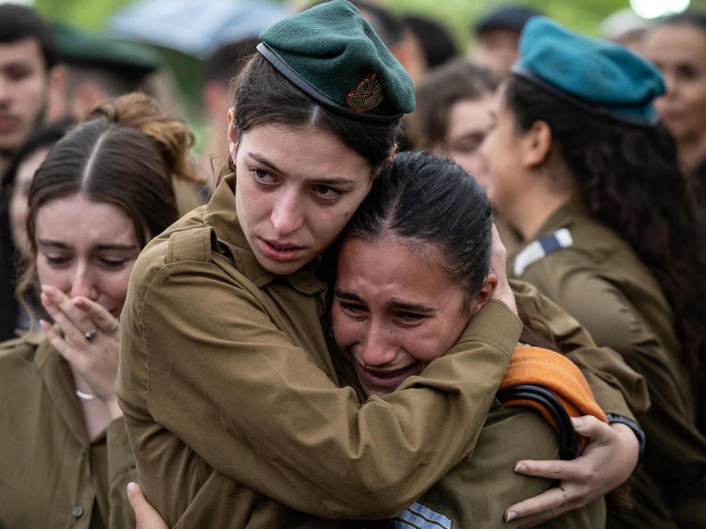 Israeli soldiers attend the funeral of a fellow soldier in a military cemetery in Jerusalem. Picture: AFP