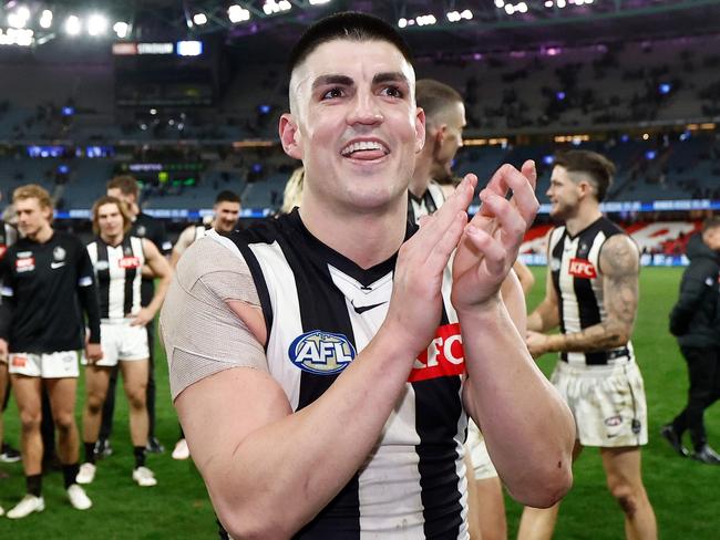 MELBOURNE, AUSTRALIA - JUNE 16: Brayden Maynard of the Magpies celebrates after his 200th match during the 2024 AFL Round 14 match between the North Melbourne Kangaroos and the Collingwood Magpies at Marvel Stadium on June 16, 2024 in Melbourne, Australia. (Photo by Michael Willson/AFL Photos via Getty Images)