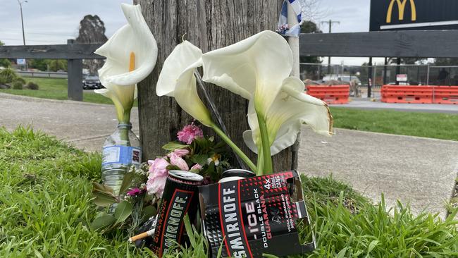 Tributes left outside the crash scene where Tony Muller, 29, was killed on Boronia Rd, Wantirna on September 20, 2022. Picture: Kiel Egging.