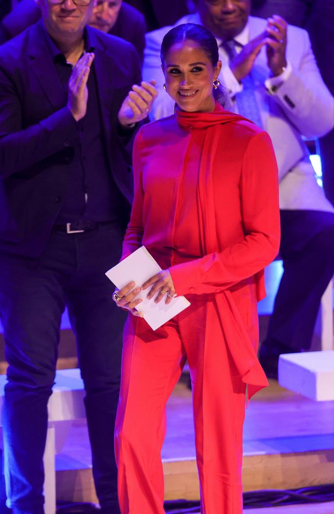 Meghan Markle turned heads in a red power suit at the One Young World summit in 2022. Picture: Getty Images