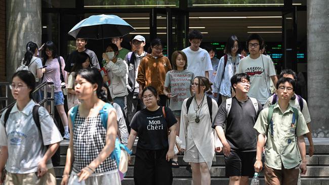 Donald Trump told reporters, ‘Chinese students are coming — no problem’. Picture: AFP