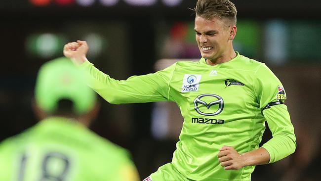 SYDNEY, AUSTRALIA - DECEMBER 28: Chris Green of the Thunder celebrates taking the wicket of Dan Hughes of the Sixers during the Big Bash League match between the Sydney Sixers and the Sydney Thunder at the Sydney Cricket Ground on December 28, 2019 in Sydney, Australia. (Photo by Mark Metcalfe/Getty Images)