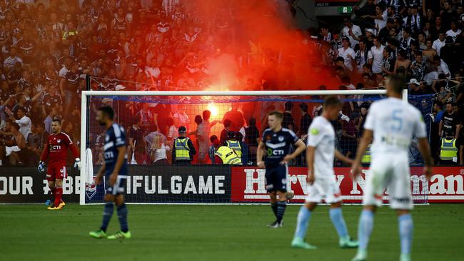 Flares marred the latest Melbourne derby as the A-League struggles to deal effectively with anti-social behaviour at matches.