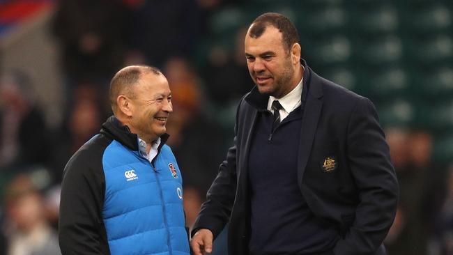 England coach Eddie Jones (L) with former Australia coach Michael Cheika. Picture: Adrian Dennis/AFP