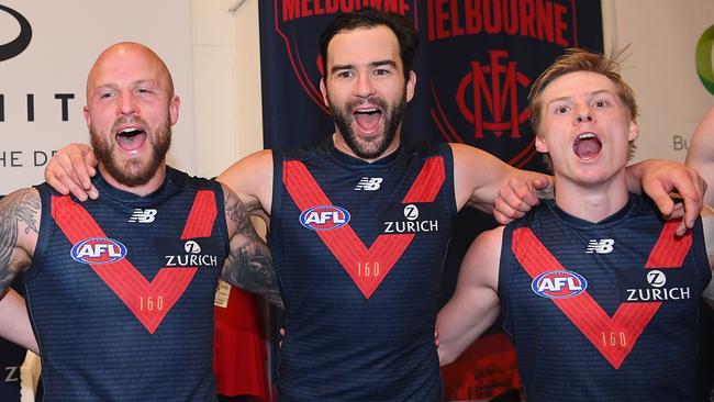 Nathan Jones, Jordan Lewis and Charlie Spargo sing the song after beating GWS. Pic: Getty Images