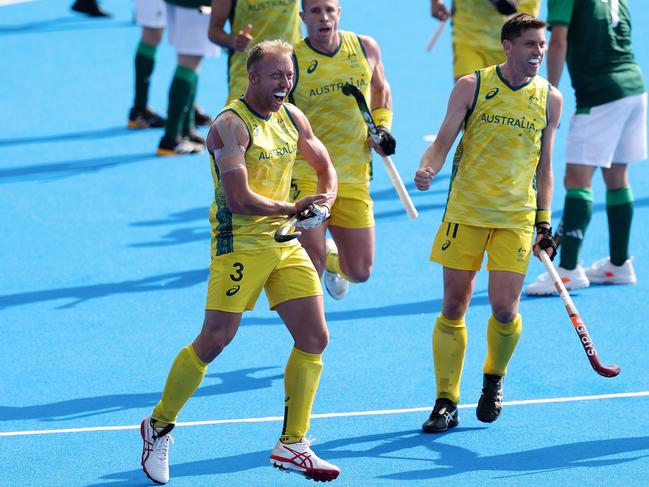 PARIS, FRANCE - JULY 29: Corey Weyer of Team Australia celebrates scoring his team's first goal with teammates during the Men's Pool B match between Ireland and Australia on day three of the Olympic Games Paris 2024 at Stade Yves Du Manoir on July 29, 2024 in Paris, France. (Photo by Lintao Zhang/Getty Images)
