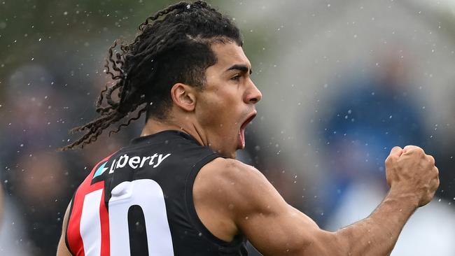 MELBOURNE, AUSTRALIA - FEBRUARY 15: Isaac Kako of the Bombers celebrates kicking a goal during the 2025 AFL Pre-Season match between Western Bulldogs and Essendon Bombers at Whitten Oval on February 15, 2025 in Melbourne, Australia. (Photo by Quinn Rooney/Getty Images)