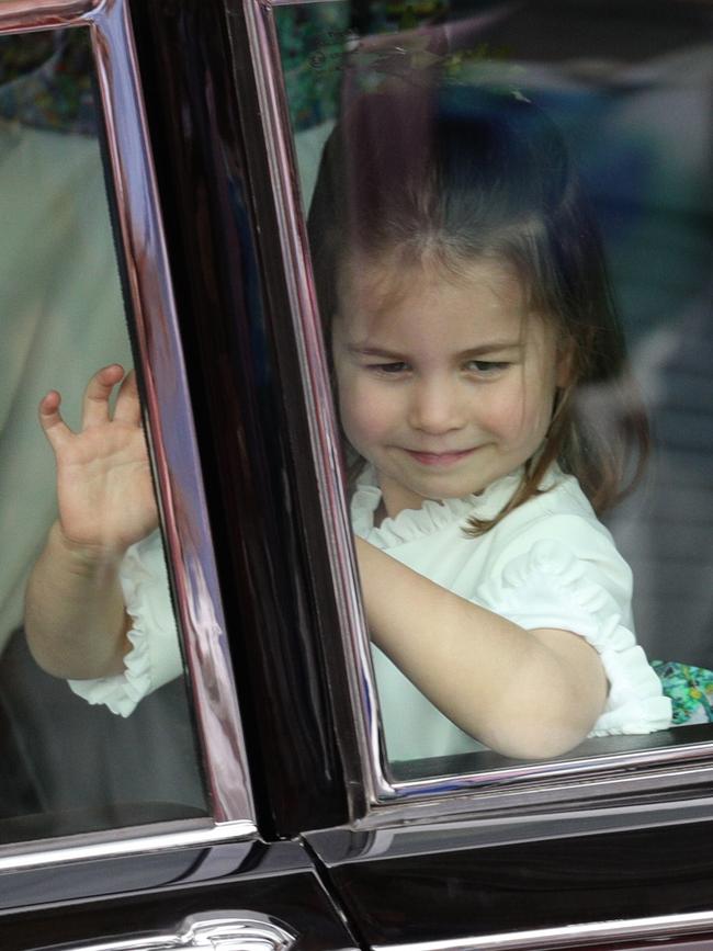 Bridesmaid Princess Charlotte of Cambridge giving a cheeky wave. Picture: Getty