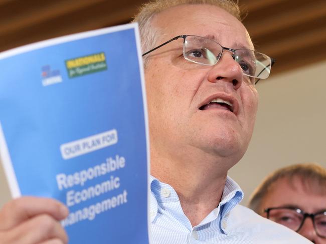 DARWIN, AUSTRALIA - MAY 17: Prime Minister Scott Morrison speaks at a press conference during a visit to the Alpha Homes Display Home in the suburb of Johnston, which is in the Lingiari electorate, on May 17, 2022 in Darwin, Australia. The Australian federal election will be held on Saturday 21 May. (Photo by Asanka Ratnayake/Getty Images)