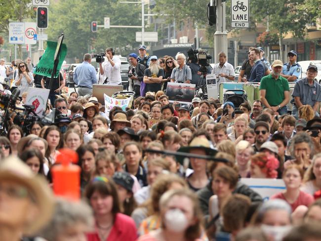 The protesters claim the NSW bushfires have been supercharged by climate change. Picture: Richard Dobson