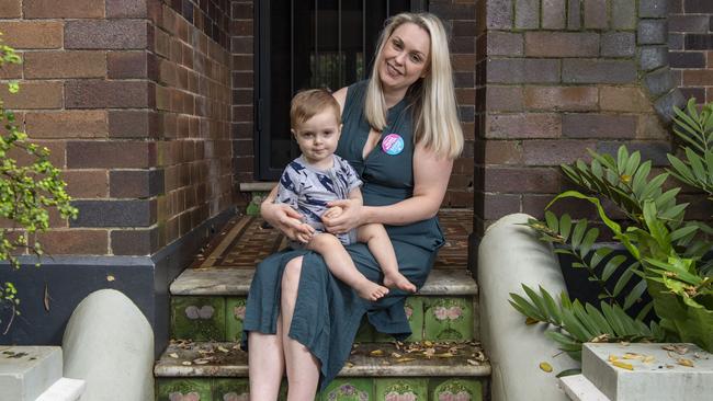 Midwife Zoe Edwards with her son Oisin at her Dulwich Hill home. She quit her job because a midwife shortage led to her being refused leave. Pic: Simon Bullard