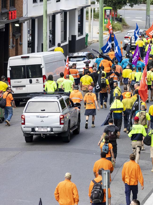 CFMEU members march in the street in Brisbane’s Newstead last year, on their way to the government’s HQ at 1 William Street, to demand the resignation of long-time DG Neil Scales.