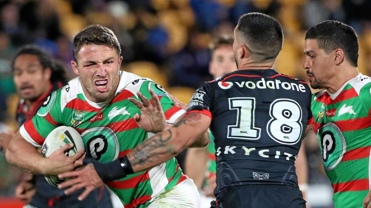 Samuel Burgess of the Rabbitohs (left) is tackled by Gerard Beale of the New Zealand Warriors. Picture: FIONA GOODALL