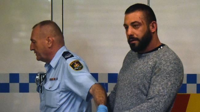 Ricardo Barbaro is escorted to a prison van in Sydney, earlier this week.