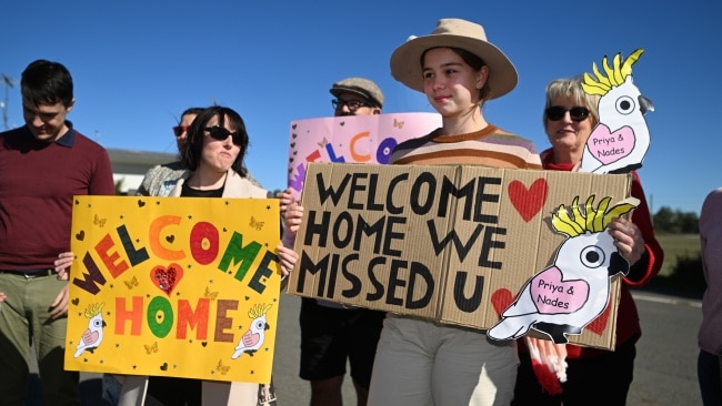Crowds gathered to greet the family as they landed. Picture: Getty Images