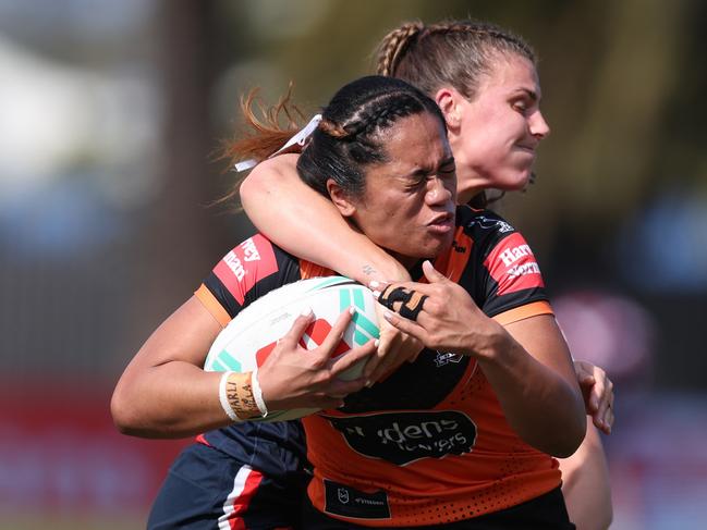 Leianne Tufuga of the Tigers cops a high shot. Picture: Getty Images