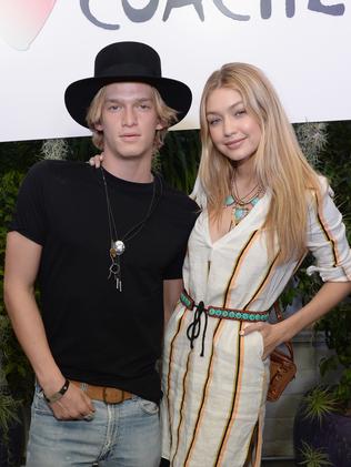 BYO style ... Singer Cody Simpson (L) and model Gigi Hadid at the Official H &amp; M Loves Coachella Party at the Parker Palm Springs. Picture: Michael Kovac/Getty Images for H &amp; M