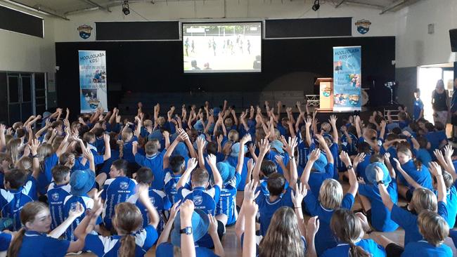 Mooloolaba State School cheering home the side from the hall.