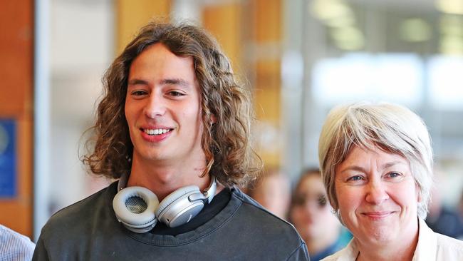 Formula 3 driver Alex Peroni arrives back in Hobart after his horror smash. Picture: Zak Simmonds