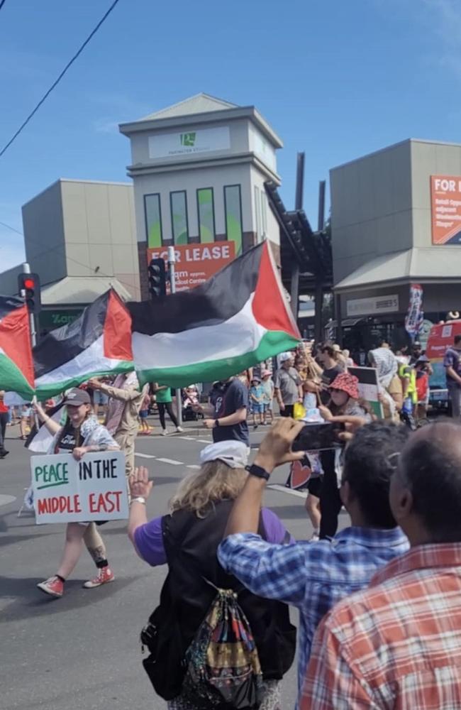 Pro-Palestine demonstrators marched at the end of Pako Festa's parade in Geelong West for the second year in a row, seeing a mixed reaction with some cheers and some jeers. Photo: Brendan Kearns.