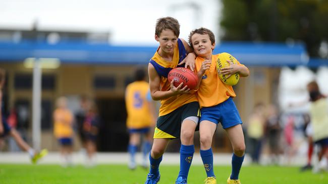 Corey Durdin (left) played for both Gaza and Golden Grove growing up in SA. Picture: File