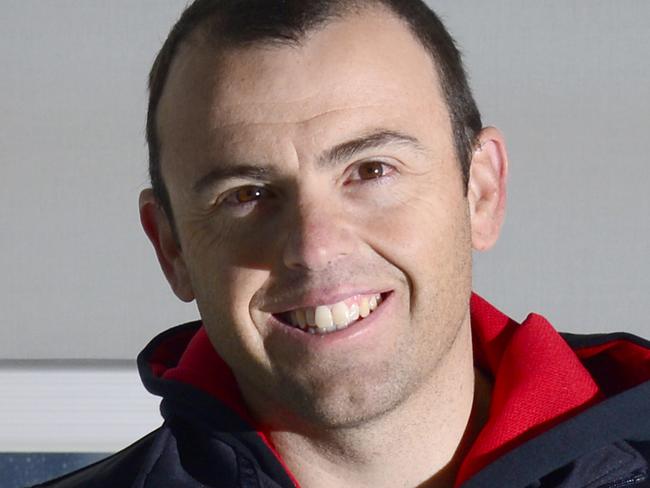 Tim Decker is coach of Olympic hopeful Glenn O'Shea and is travelling to London for the games. Pictured at Adelaide Airport ready to check in.