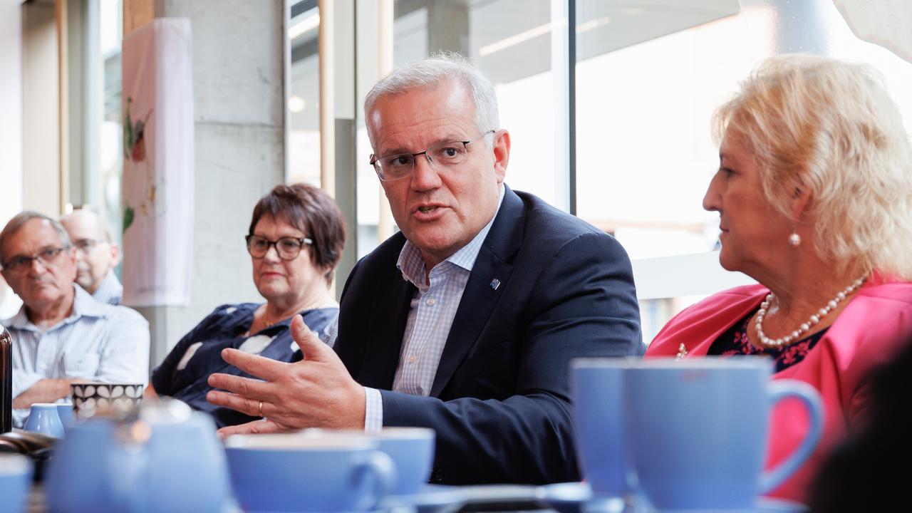 Prime Minister Scott Morrison wit Michelle Landry visits seniors at Humminbird cafe to discuss the cost of living pressures. Picture: Jason Edwards