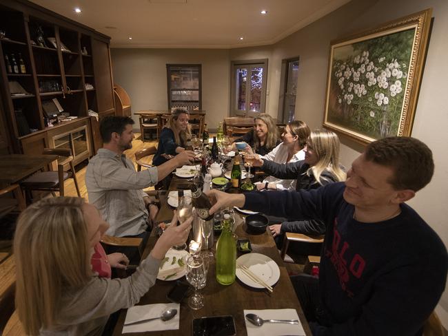 SYDNEY, AUSTRALIA - MAY 15: A group of friends dine at Yama Gardens in Darlinghurst on May 15, 2020 in Sydney, Australia. Restrictions put in place in response to the COVID-19 outbreak have been eased in New South Wales as of today, with social distancing measures relaxed in response to Australia's declining number of confirmed coronavirus cases. From Friday May 15, cafes and restaurants along with pub and club dining areas are allowed to reopen for up to 10 patrons at a time. Outdoor gatherings of up to 10 people are now also permitted, while outdoor gyms, playgrounds, swimming pools can also open. Up to 10 guests can attend a wedding while 20 mourners are permitted for an indoor funeral, or 30 can attend if the service is outdoors. Religious gatherings and places of worship can have 10 worshipers at one time, while people are permitted to have up to five visitors in their homes at any one time. (Photo by Ryan Pierse/Getty Images)