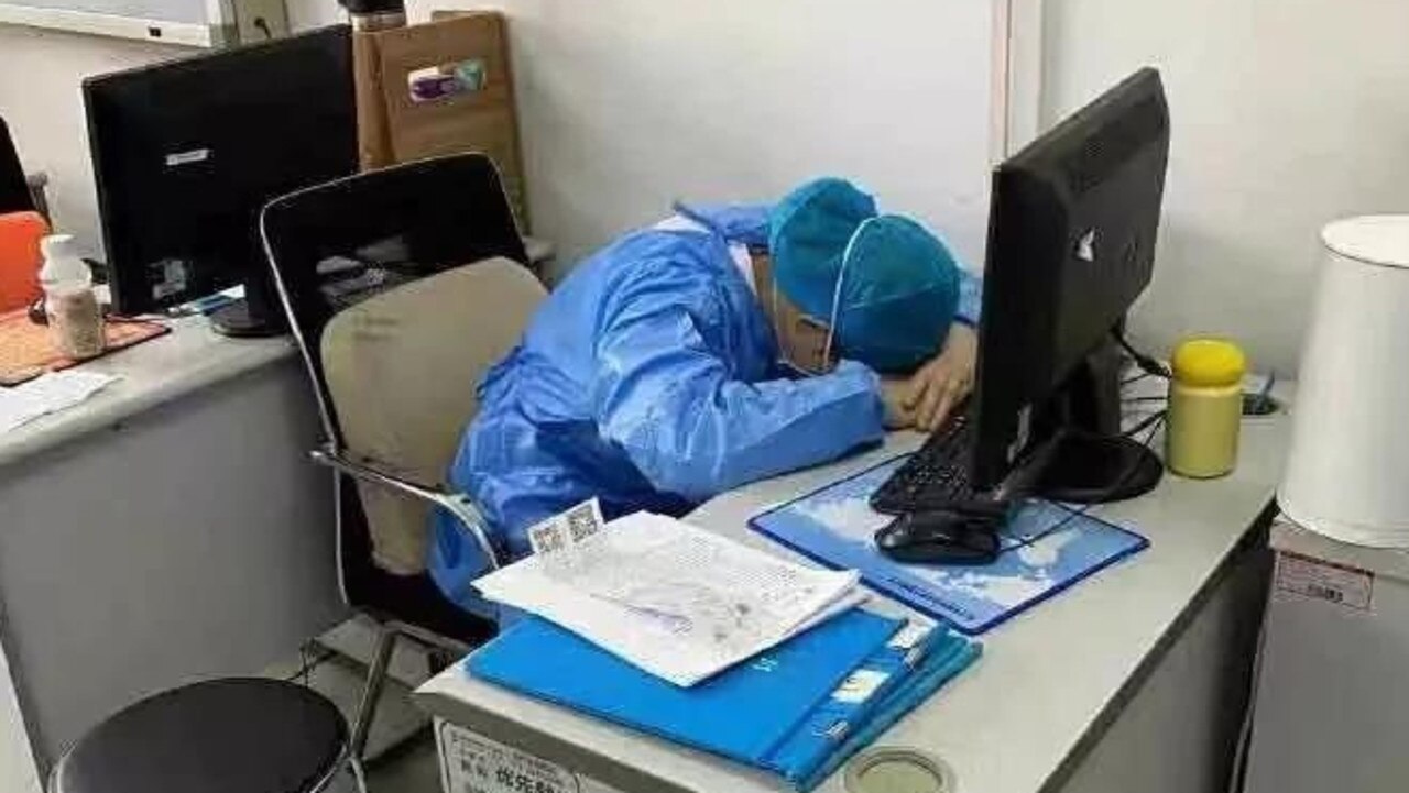 This medic was spotted sleeping at their desk. Picture: Twitter