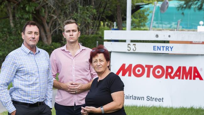 Cr Steve Griffiths, Nathan Action Group spokesman Blake Buchanan and Annamarie Newton pose for a photograph in Fairlawn Street, Nathan. (AAP Image/Renae Droop)