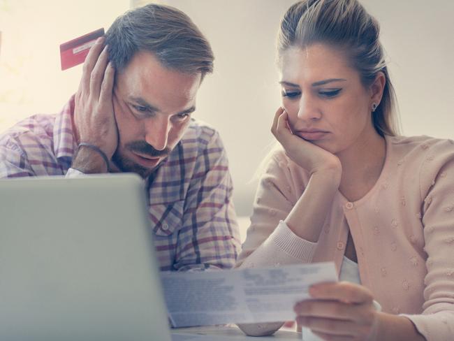 A couple having problems with their bills and money including credit card debt. Picture: iStock.