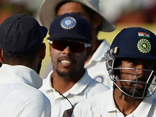 Indian team players shake hands with each other after the fifth day of the third cricket Test match between India and Australia at the Jharkhand State Cricket Association (JSCA) Stadium complex in Ranchi on March 20, 2017. ----IMAGE RESTRICTED TO EDITORIAL USE - STRICTLY NO COMMERCIAL USE----- / GETTYOUT---- / AFP PHOTO / SAJJAD HUSSAIN / ----IMAGE RESTRICTED TO EDITORIAL USE - STRICTLY NO COMMERCIAL USE----- / GETTYOUT