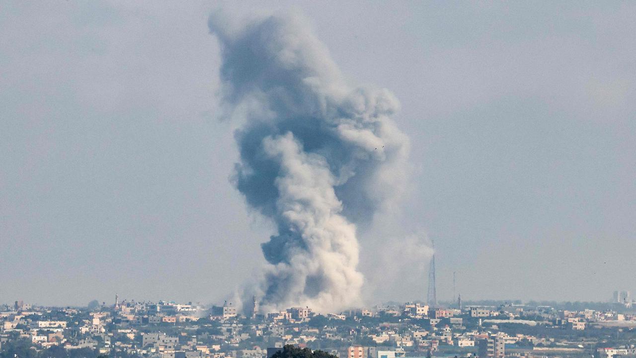 A smoke plume erupts during Israeli bombardment in Rafah in the southern Gaza Strip. Picture: Said Khatib/AFP