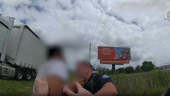 Police cameras captured the moments a truck driver allegedly blew 0.311 by the side of the road near Dreamworld.