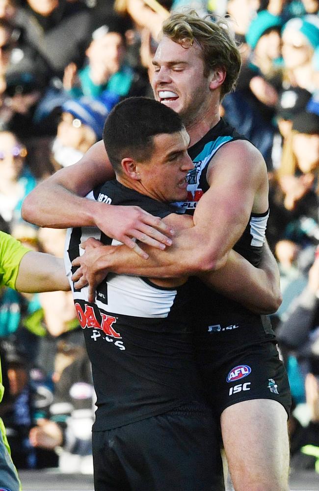 Jack Watts and Tom Rockliff celebrate a goal during the Round 16 match against St Kilda. Picture: AAP Image/David Mariuz