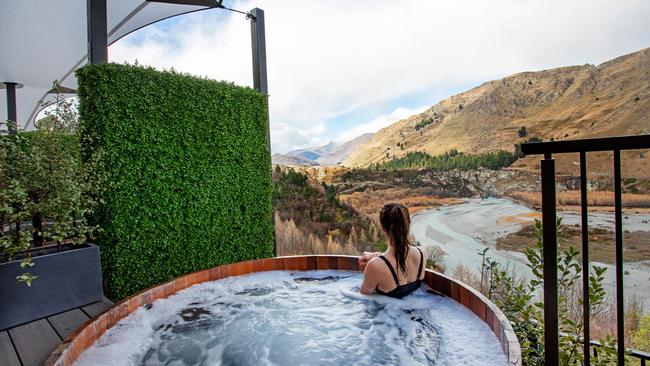 Soaking up the views from Onsen Hot Pools. Picture: Destination Queenstown