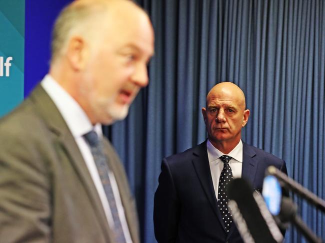 Tasmanian premier Peter Gutwein looks on as Public Health director Mark Veitch addresses the media during the Tasmanian Government Coronavirus update. Picture: Zak Simmonds