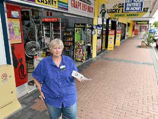 MAJOR DOWNTURN: Claudia Davidson, owner of Cores Lucky Black Cat Casket Agency in Adelaide St, says her business has lost thousands of dollars since the Maryborough Heritage Markets moved. Picture: Alistair Brightman