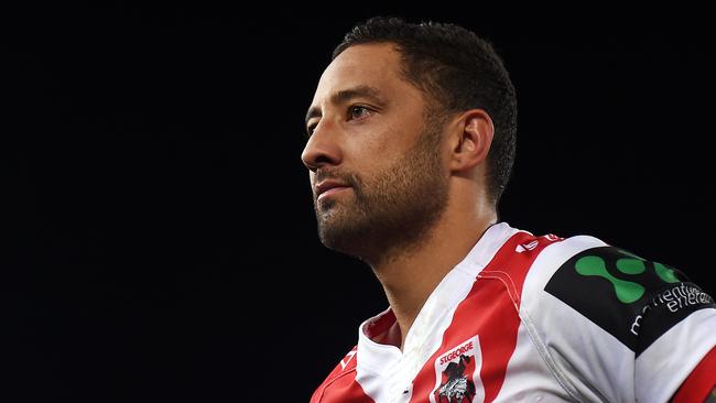 Benji Marshall of the Dragons looks on.