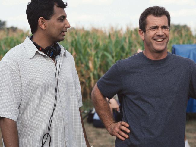 M. Night Shyamalan with actor Mel Gibson filming Signs.