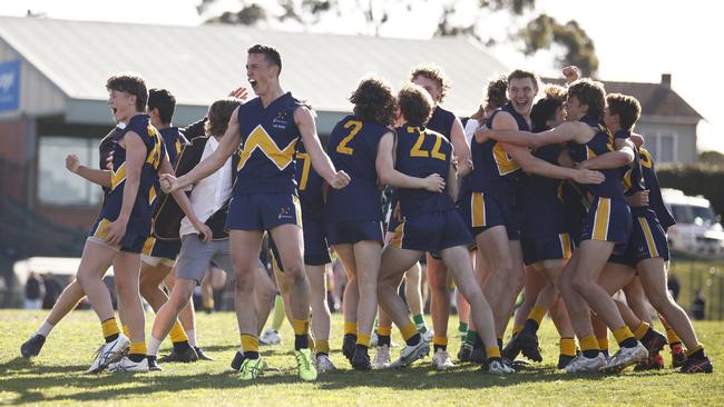 Whitefriars College players celebrate on the final siren. Photo: Daniel Pockett/AFL Photos