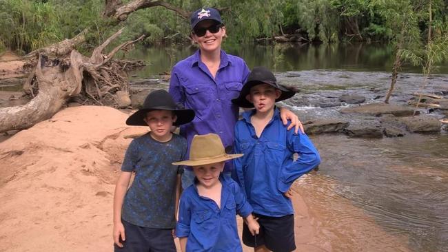 Mary-Lou, George, Willard and Stirling McGregor-Shaw on a weekend fishing trip.