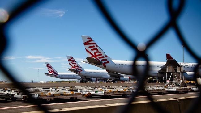 Virgin Australia aircraft parked at Brisbane Airport. Picture: Patrick Hamilton/AFP